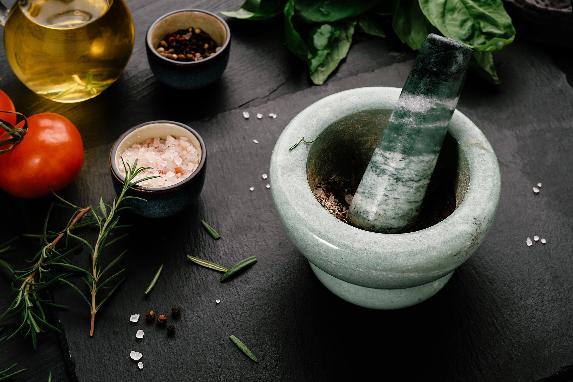 Close up of herbs and mortar